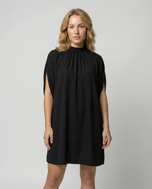 Veska | Klänning med Fladdermusärmar | Lös Passform och Modern Stil
