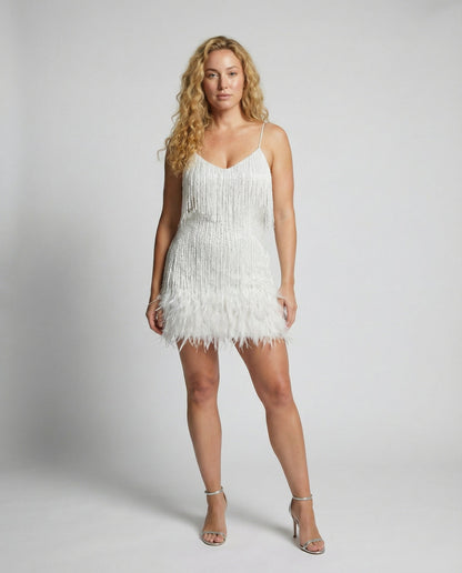 Veska | Cocktailklänning med Paljetter | Figursydd Silhuett och Glamour