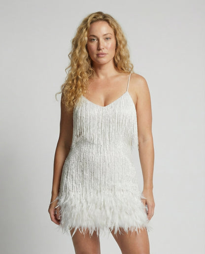 Veska | Cocktailklänning med Paljetter | Figursydd Silhuett och Glamour