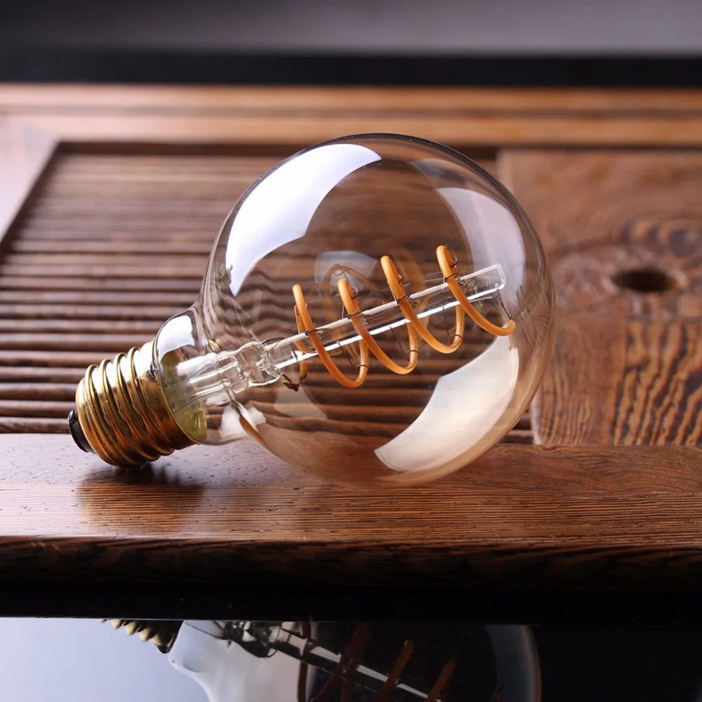 Dimbar Vintage LED-lampa (3W, E27-fäste) - Guldig spiraltråd för ljuskronor och dekorativ belysning | Veska