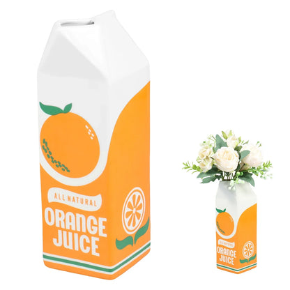Keramisk vas med apelsinjuice | Veska