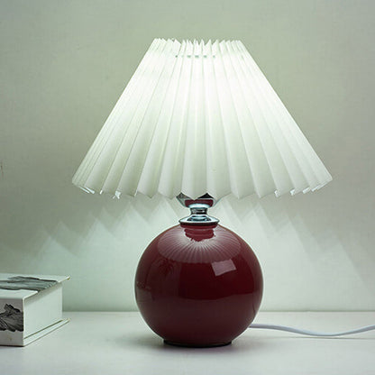 Nordisk minimalistisk 1-ljuskälla bordslampa gjord av keramik med veck | Veska