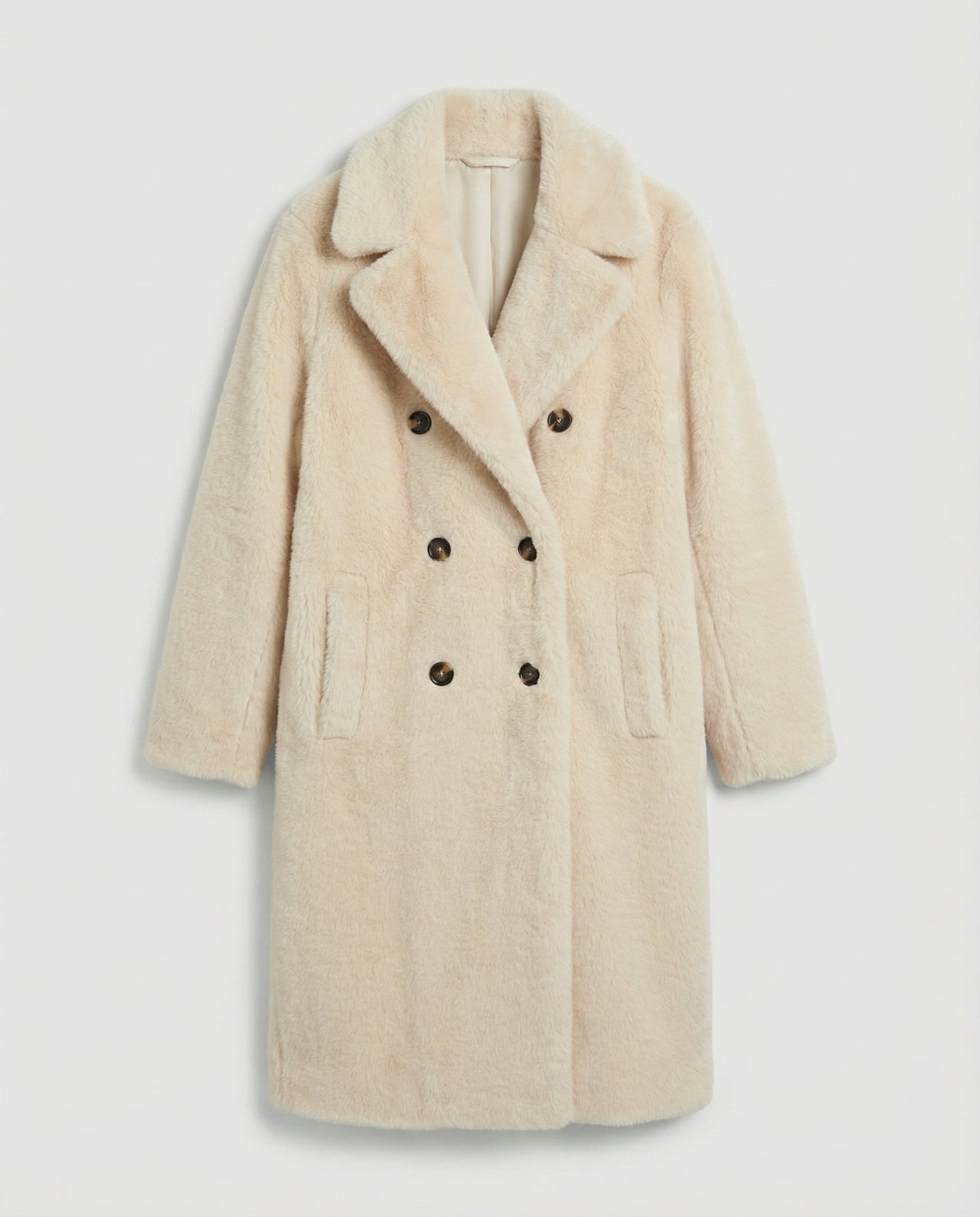 Beige coat with fur collar on a light gray background