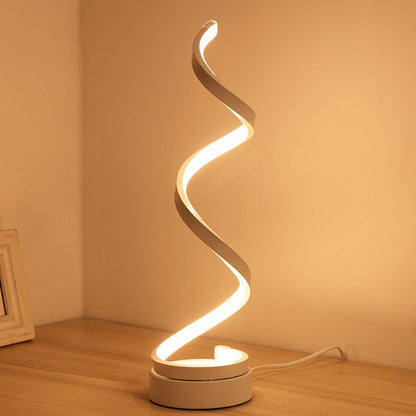 SpiraLuxe – Modern LED Bordslampa med Spiraldesign Veska